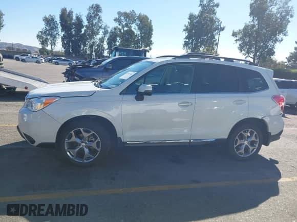 2016 Subaru Forester Touring with VIN JF2SJAXC4GH537026, listed as a IAAI auction lot 43501461 with 66,452 mi miles and . Bid and sale history available at DreamBid. Image 14.