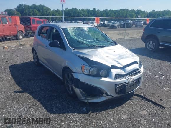 2014 Chevrolet Sonic RS with VIN 1G1JG6SB4E4234698, listed as a IAAI auction lot 42553027 with 149,958 mi miles and . Bid and sale history available at DreamBid. Image 1.