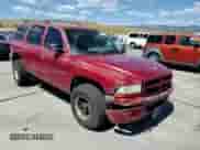 1999 Dodge Durango with VIN 1B4HS28Z7XF612776, listed as a Copart auction lot 63610355 with 223,997 mi miles and Salvage title. Bid and sale history available at DreamBid. Image 14.