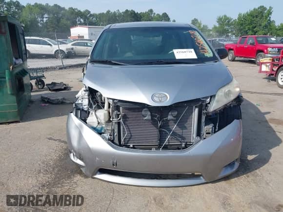 2013 Toyota Sienna L with VIN 5TDZK3DC3DS348420, listed as a IAAI auction lot 42560718 with 221,621 mi miles and . Bid and sale history available at DreamBid. Image 13.