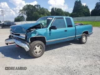 1997 Chevrolet Silverado 1500 with VIN 2GCEC19R5V1203935, listed as a Copart auction lot 69227255 with 183,063 mi miles and Salvage title. Bid and sale history available at DreamBid. Image 1.