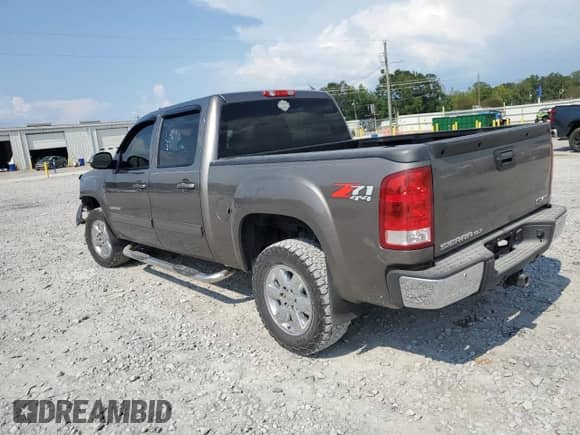 2013 GMC Sierra 1500 SLT с VIN 3GTP2WE79DG125341, выставлен на аукционе Copart как лот 69387625 с пробегом 245 621 миль миль и Списание • Salvage title. История ставок и продаж доступна на DreamBid. Изображение 2.