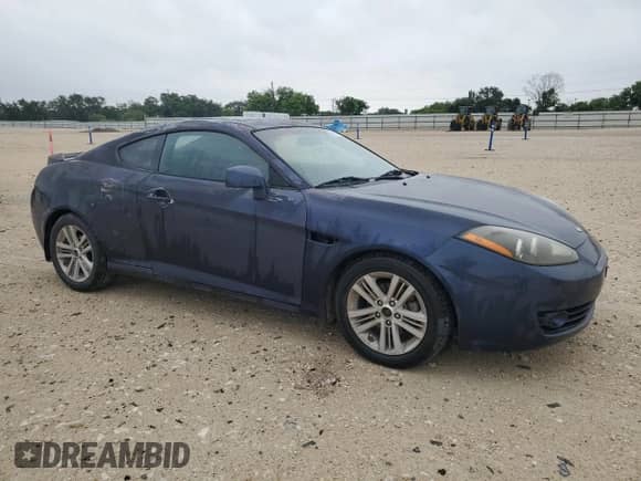 2008 Hyundai Tiburon GS с VIN KMHHM66D28U284008, выставлен на аукционе Copart как лот 55500035 с пробегом 108 084 миль миль и Списание • Salvage title. История ставок и продаж доступна на DreamBid. Изображение 4.