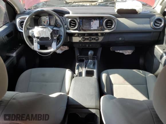 2018 Toyota Tacoma SR5 с VIN 3TMBZ5DN9JM012115, выставлен на аукционе Copart как лот 66775075 с пробегом 62 176 миль миль и Списание • Salvage title. История ставок и продаж доступна на DreamBid. Изображение 8.
