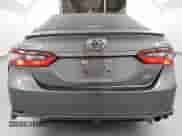 2023 Toyota Camry SE with VIN 4T1G11AK3PU750783, listed as a Copart auction lot 80610725 with 61,857 mi miles and Salvage title. Bid and sale history available at DreamBid. Image 6.