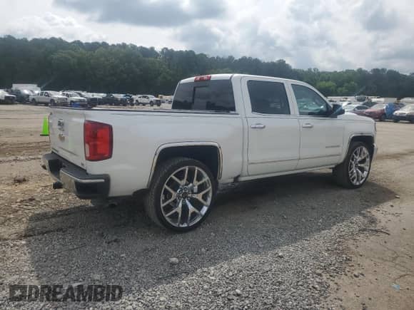 2017 Chevrolet Silverado 1500 LTZ with VIN 3GCPCSEC3HG191151, listed as a Copart auction lot 58218795 with 134,276 mi miles and Salvage title. Bid and sale history available at DreamBid. Image 3.
