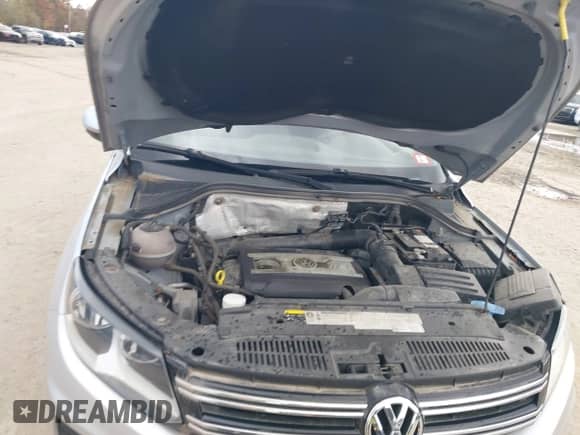 2014 Volkswagen Tiguan S with VIN WVGBV3AXXEW596502, listed as a IAAI auction lot 43538779 with 111,908 mi miles and . Bid and sale history available at DreamBid. Image 10.