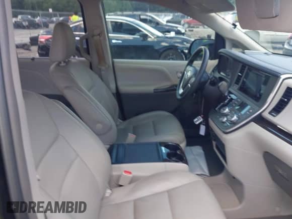 2015 Toyota Sienna XLE with VIN 5TDYK3DC2FS656032, listed as a IAAI auction lot 42662413 with 50,329 mi miles and . Bid and sale history available at DreamBid. Image 5.