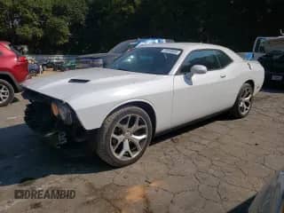 2016 Dodge Challenger SXT с VIN 2C3CDZAG7GH225477, выставлен на аукционе Copart как лот 72010035 с пробегом 86 350 миль миль и Списание • Salvage title. История ставок и продаж доступна на DreamBid. Изображение 1.