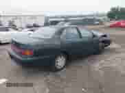 1993 Toyota Camry LE z VIN 4T1SK12E2PU176189, wystawiony jako IAAI lot #42711266 z przebiegiem 141 263 mil mil oraz . Historia ofert i sprzedaży dostępna na DreamBid. Obrazek 4.