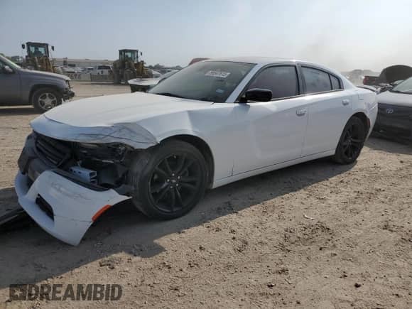 2018 Dodge Charger SXT with VIN 2C3CDXBG5JH272615, listed as a Copart auction lot 89547615 with 106,068 mi miles and Salvage title. Bid and sale history available at DreamBid. Image 1.