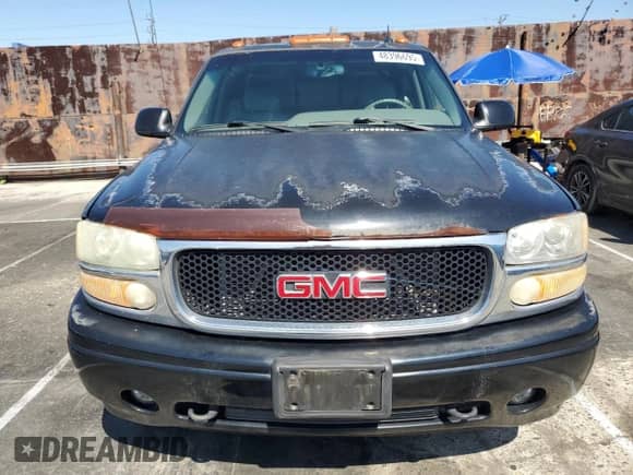 2002 GMC Sierra 1500 Denali z VIN 2GTFK69U821391080, wystawiony jako Copart lot #48396695 z przebiegiem 150 922 mil mil oraz Czysty tytuł • Clean title. Historia ofert i sprzedaży dostępna na DreamBid. Obrazek 5.