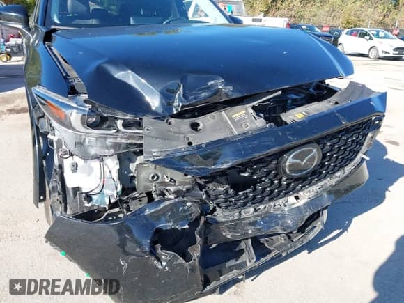 2025 Mazda CX-5 S Select z VIN JM3KFBBLXS0589143, wystawiony jako IAAI lot #43401475 z przebiegiem 24 004 mil mil oraz . Historia ofert i sprzedaży dostępna na DreamBid. Obrazek 6.