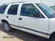 1996 Chevrolet Blazer with VIN 1GNCS13W7T2105518, listed as a IAAI auction lot 43140584 with 211,245 mi miles and . Bid and sale history available at DreamBid. Image 12.