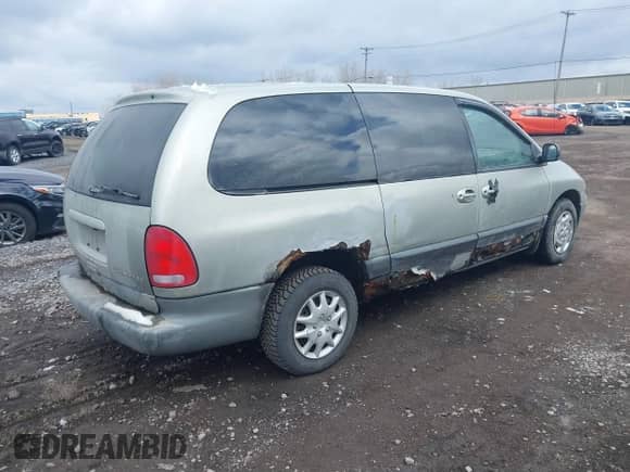1999 Dodge Caravan SE with VIN 1B4GP44R4XB854348, listed as a IAAI auction lot 41871640 with 169,312 mi miles and . Bid and sale history available at DreamBid. Image 4.