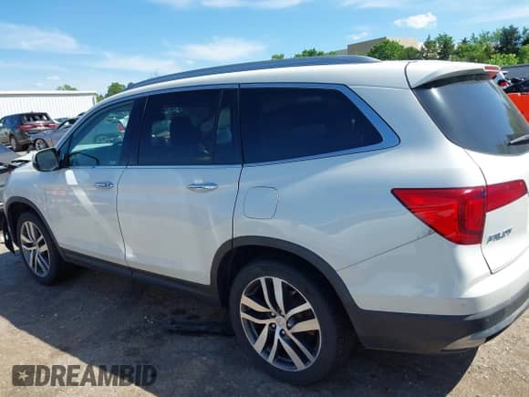 2018 Honda Pilot Touring с VIN 5FNYF6H95JB001137, выставлен на аукционе IAAI как лот 42146265 с пробегом 112 163 миль миль и . История ставок и продаж доступна на DreamBid. Изображение 14.