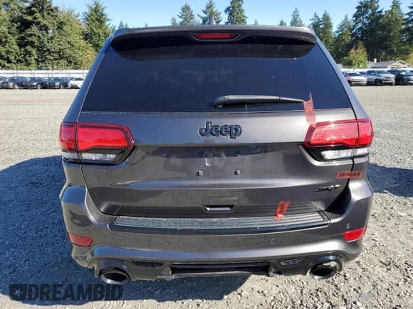 2018 Jeep Grand Cherokee SRT z VIN 1C4RJFDJ9JC206783, wystawiony jako Copart lot #82461455 z przebiegiem 63 990 mil mil oraz Szkoda całkowita • Salvage title. Historia ofert i sprzedaży dostępna na DreamBid. Obrazek 6.