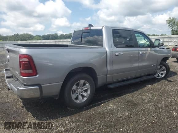 2023 Ram 1500 Laramie with VIN 1C6SRFJT3PN672357, listed as a Copart auction lot 63852845 with 55,570 mi miles and Salvage title. Bid and sale history available at DreamBid. Image 3.