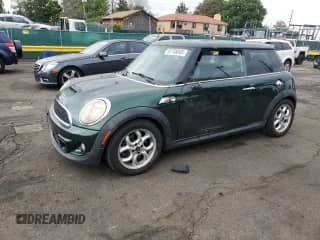 2011 MINI Hardtop S with VIN WMWSV3C59BTY11393, listed as a Copart auction lot 62758045 with 102,544 mi miles and Salvage title. Bid and sale history available at DreamBid. Image 1.