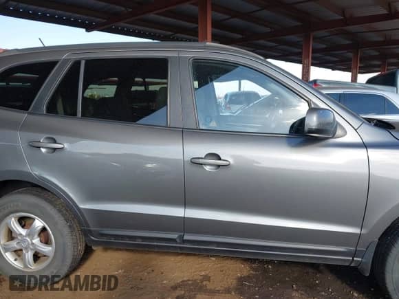 2009 Hyundai Santa Fe GL z VIN 5NMSG73E79H263961, wystawiony jako IAAI lot #41419880 z przebiegiem 165 964 mil mil oraz . Historia ofert i sprzedaży dostępna na DreamBid. Obrazek 14.