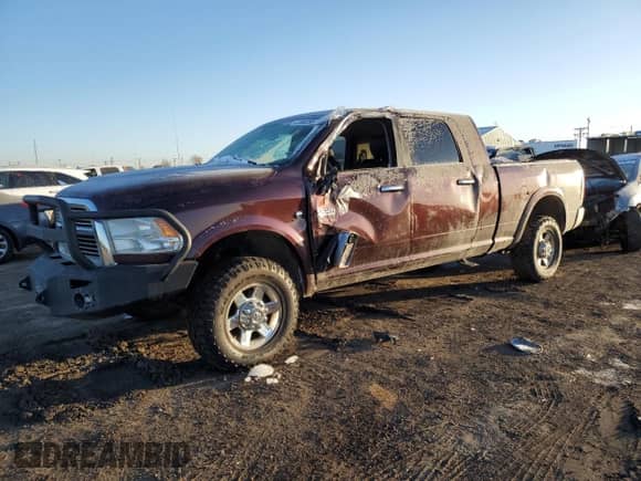 2012 Dodge RAM with VIN 3C63D3ML0CG137423, listed as a Copart auction lot 41890265 with 194,586 mi miles and Salvage title. Bid and sale history available at DreamBid. Image 1.