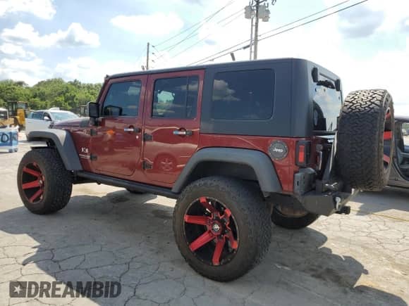 2008 Jeep Wrangler Unlimited X z VIN 1J4GA39148L574890, wystawiony jako Copart lot #62991305 z przebiegiem 187 036 mil mil oraz Szkoda całkowita • Salvage title. Historia ofert i sprzedaży dostępna na DreamBid. Obrazek 2.