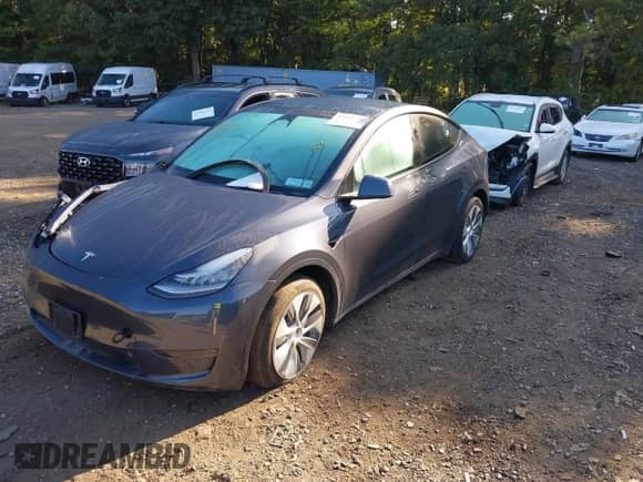 2023 Tesla Model Y Long Range with VIN 7SAYGDEE6PA098084, listed as a IAAI auction lot 43095726 with 30,506 mi miles and . Bid and sale history available at DreamBid. Image 20.