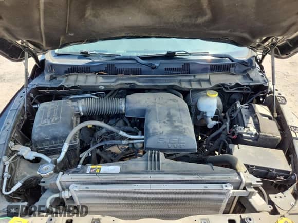 2021 Ram 1500 Tradesman z VIN 1C6RR6FG2MS500439, wystawiony jako Copart lot #66934335 z przebiegiem 62 441 mil mil oraz Szkoda całkowita • Salvage title. Historia ofert i sprzedaży dostępna na DreamBid. Obrazek 11.