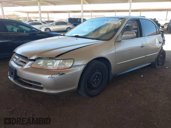 2002 Honda Accord LX z VIN JHMCG665X2C000070, wystawiony jako IAAI lot #42858906 z przebiegiem 241 464 mil mil oraz . Historia ofert i sprzedaży dostępna na DreamBid. Obrazek 17.