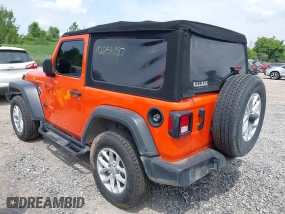2023 Jeep Wrangler Sport with VIN 1C4HJXAG1PW692362, listed as a IAAI auction lot 42659087 with 52,179 mi miles and . Bid and sale history available at DreamBid. Image 3.