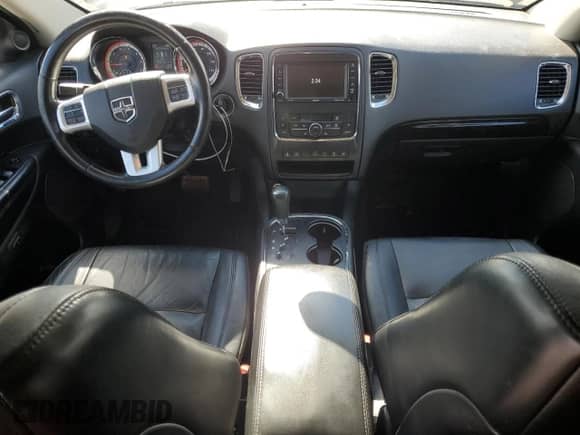 2013 Dodge Durango Crew with VIN 1C4SDJDTXDC540807, listed as a Copart auction lot 82377085 with 170,501 mi miles and Salvage title. Bid and sale history available at DreamBid. Image 8.