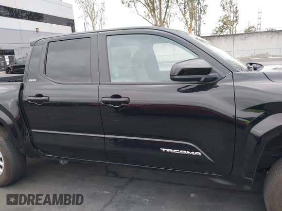 2024 Toyota Tacoma SR5 with VIN 3TMLB5JN8RM059015, listed as a IAAI auction lot 43328924 with 12,602 mi miles and . Bid and sale history available at DreamBid. Image 14.