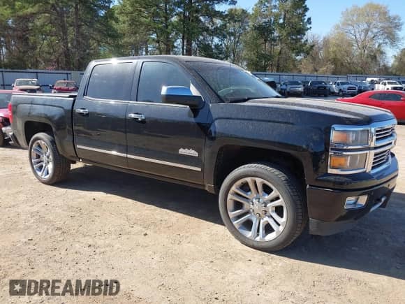 2014 Chevrolet Silverado 1500 High Country with VIN 3GCPCTEJ8EG301756, listed as a IAAI auction lot 41826109 with 185,576 mi miles and . Bid and sale history available at DreamBid. Image 1.