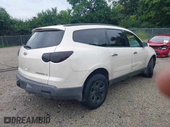 2012 Chevrolet Traverse 2LT z VIN 1GNKRJED7CJ311222, wystawiony jako IAAI lot #42856807 z przebiegiem 151 939 mil mil oraz . Historia ofert i sprzedaży dostępna na DreamBid. Obrazek 4.