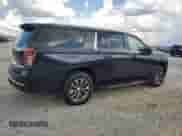 2023 Chevrolet Suburban LS с VIN 1GNSCBKD4PR403603, выставлен на аукционе Copart как лот 65908005 с пробегом 26 049 миль миль и Списание • Salvage title. История ставок и продаж доступна на DreamBid. Изображение 3.