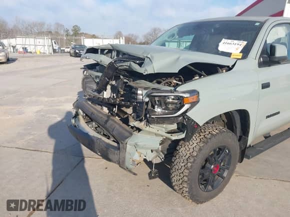 2021 Toyota Tundra SR5 with VIN 5TFDY5F14MX046533, listed as a IAAI auction lot 41663194 with 55,758 mi miles and . Bid and sale history available at DreamBid. Image 6.