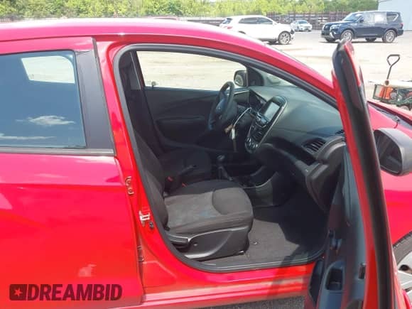 2017 Chevrolet Spark LS with VIN KL8CA6SAXHC765156, listed as a IAAI auction lot 42458711 with 51,350 mi miles and . Bid and sale history available at DreamBid. Image 5.