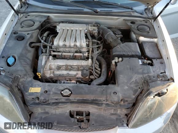 2005 Hyundai Tiburon GT с VIN KMHHN65F05U171038, выставлен на аукционе Copart как лот 87765735 с пробегом 113 129 миль миль и Списание • Salvage title. История ставок и продаж доступна на DreamBid. Изображение 12.