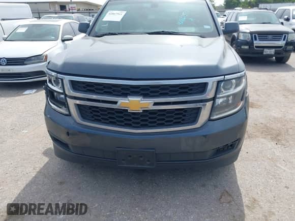 2019 Chevrolet Tahoe LS with VIN 1GNSCAKC3KR169156, listed as a IAAI auction lot 42867511 with 124,866 mi miles and . Bid and sale history available at DreamBid. Image 12.