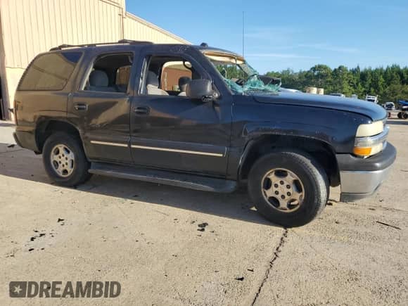 2004 Chevrolet Tahoe LS with VIN 1GNEC13V34J111076, listed as a Copart auction lot 70892775 with 303,811 mi miles and Salvage title. Bid and sale history available at DreamBid. Image 4.