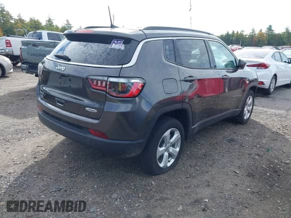 2021 Jeep Compass Altitude with VIN 3C4NJDBB2MT544968, listed as a IAAI auction lot 43290578 with 23,901 mi miles and . Bid and sale history available at DreamBid. Image 4.