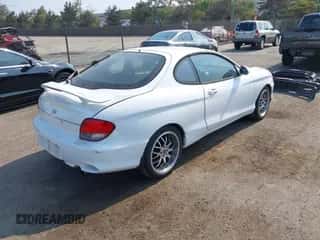 2000 Hyundai Tiburon с VIN KMHJG35F6YU202467, выставлен на аукционе IAAI как лот 42956767 с пробегом 174 269 миль миль и . История ставок и продаж доступна на DreamBid. Изображение 4.