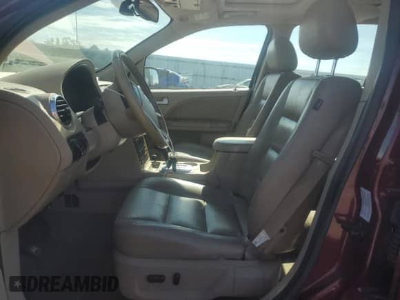 2006 Ford Freestyle Limited with VIN 1FMDK06136GA08228, listed as a Copart auction lot 69879995 with 214,776 mi miles and Salvage title. Bid and sale history available at DreamBid. Image 7.