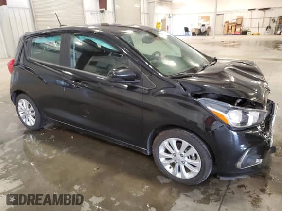 2018 Chevrolet Spark LT with VIN KL8CD6SA4JC421545, listed as a Copart auction lot 70154885 with 99,795 mi miles and Salvage title. Bid and sale history available at DreamBid. Image 4.