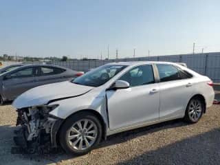 2015 Toyota Camry LE с VIN 4T1BD1FK0FU176006, выставлен на аукционе Copart как лот 69081275 с пробегом 131 855 миль миль и Списание • Salvage title. История ставок и продаж доступна на DreamBid. Изображение 1.
