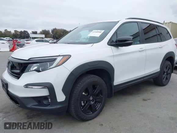 2022 Honda Pilot TrailSport with VIN 5FNYF6H8XNB082116, listed as a IAAI auction lot 42100968 with 31,697 mi miles and . Bid and sale history available at DreamBid. Image 17.