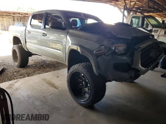 2018 Toyota Tacoma SR5 с VIN 3TMAZ5CN9JM060615, выставлен на аукционе Copart как лот 58673135 с пробегом 37 190 миль миль и Списание • Salvage title. История ставок и продаж доступна на DreamBid. Изображение 4.