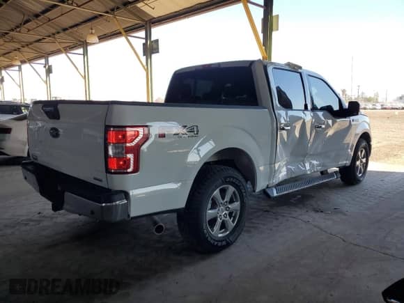 2018 Ford F-150 XLT z VIN 1FTEW1EGXJKE75905, wystawiony jako Copart lot #89911635 z przebiegiem Nie podano mil oraz Szkoda całkowita • Salvage title. Historia ofert i sprzedaży dostępna na DreamBid. Obrazek 3.
