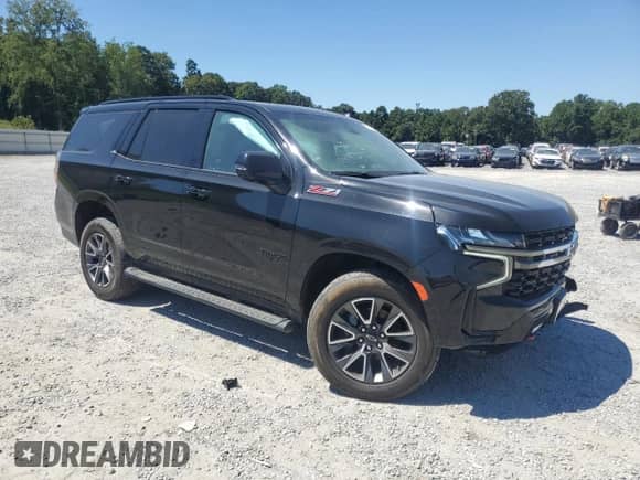 2021 Chevrolet Tahoe Z71 с VIN 1GNSKPKDXMR130937, выставлен на аукционе Copart как лот 71021095 с пробегом 84 131 миль миль и Списание • Salvage title. История ставок и продаж доступна на DreamBid. Изображение 4.