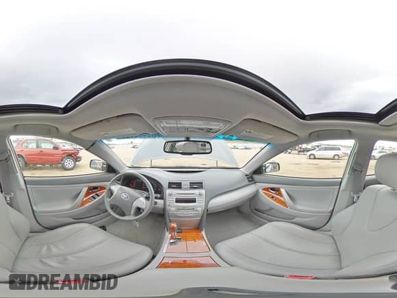 2010 Toyota Camry XLE z VIN JTNBK3EK1A3049573, wystawiony jako Copart lot #82489765 z przebiegiem 76 186 mil mil oraz Szkoda całkowita • Salvage title. Historia ofert i sprzedaży dostępna na DreamBid. Obrazek 14.